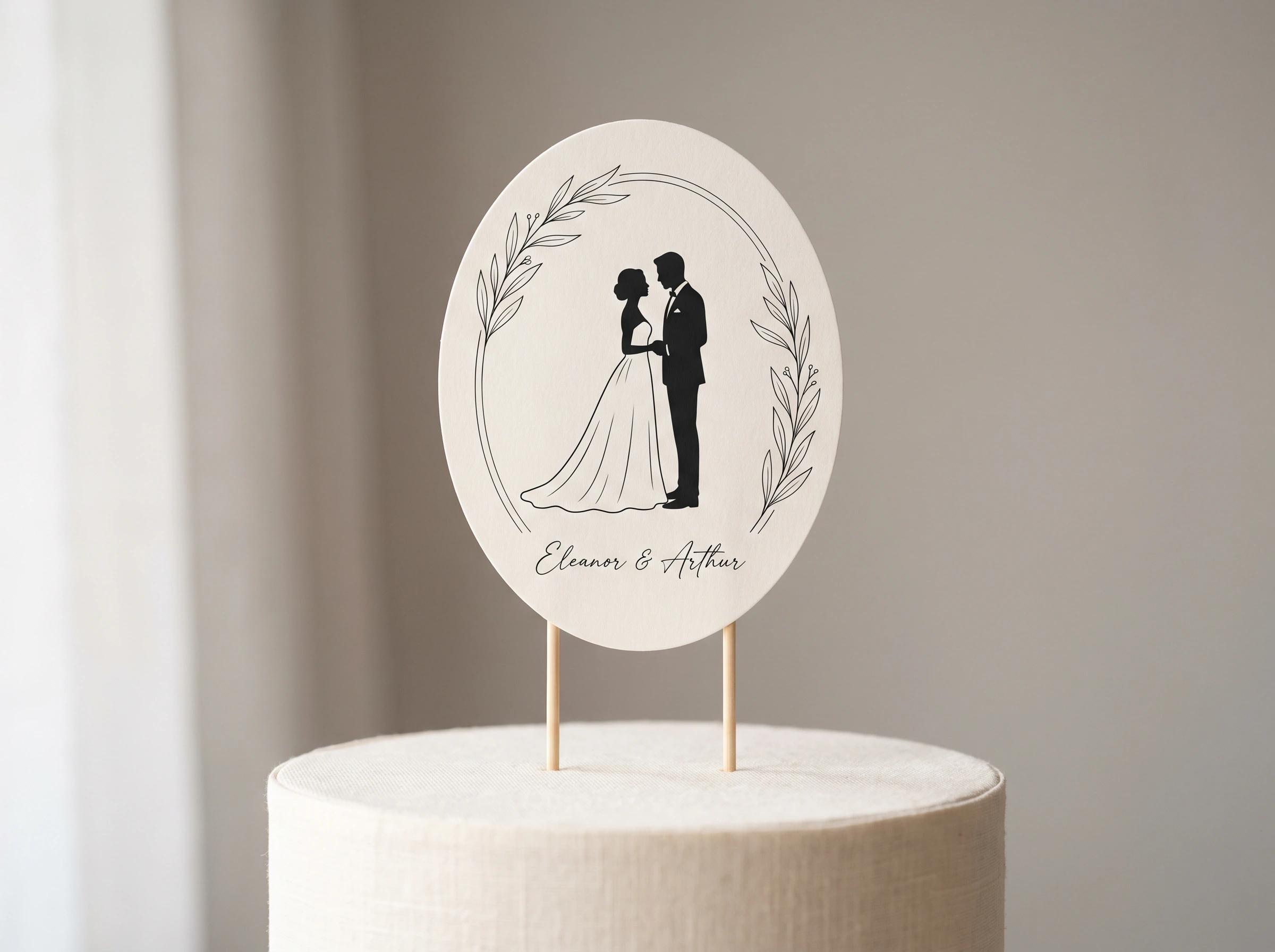 Victorian ivory and black cameo silhouette bride and groom cake topper