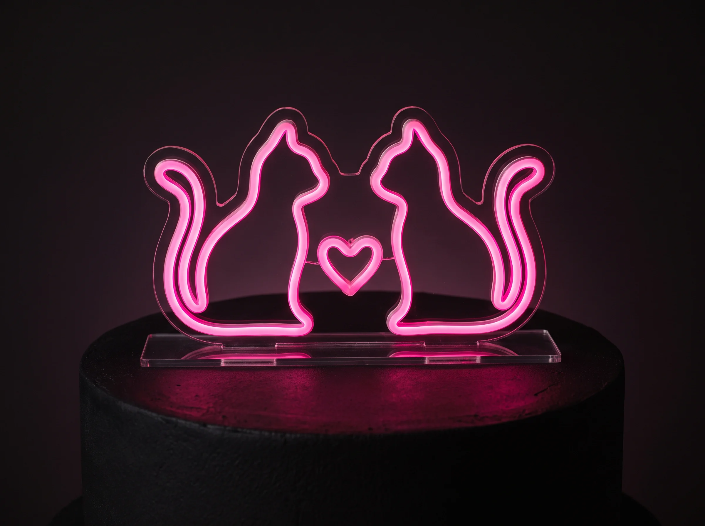Hot pink neon LED cat sign wedding cake topper glowing on clear acrylic base