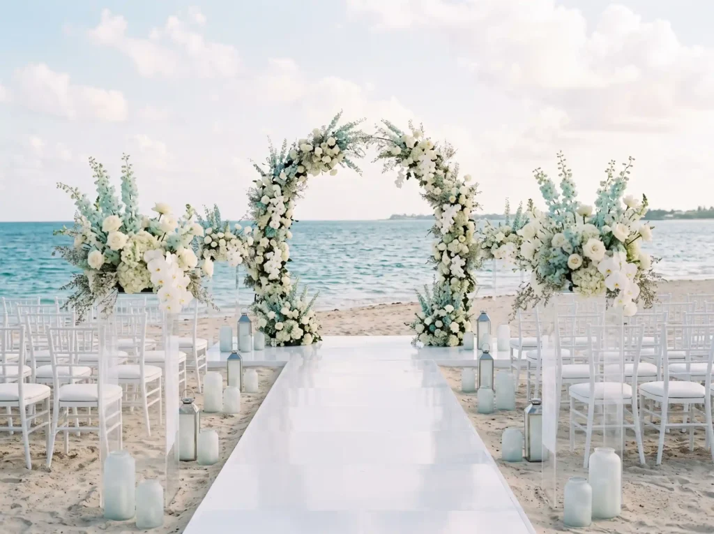 Seaglass Coastal Elegance Inspiration Inspired Coastal floral arch beachfront w…